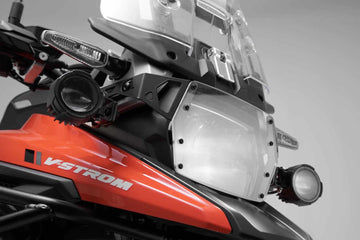 SW Motech Protector de faro. Suzuki V-Strom 1050 (19-). Soporte con panel PVC.